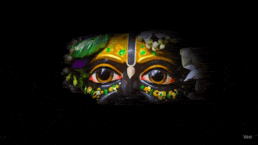 a close up of a person 's face with flowers and leaves