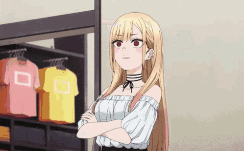 a girl with long blonde hair and red eyes is standing in front of a closet with shirts hanging on it .