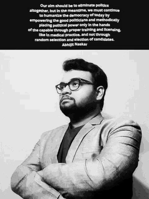 a black and white photo of a man with a quote about politics