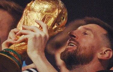 a man with a beard is holding up a trophy in his hands