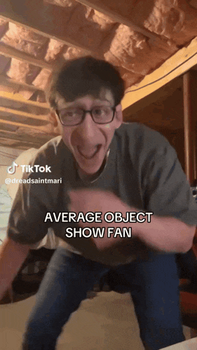 a man wearing glasses is making a funny face and says average object show fan