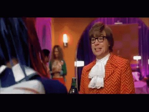 Oh You'Re Going The Right Way For A Smack-bottom And I Don'T Care Who Knows It. GIF - Austin Powers Mike Myers Twins GIFs