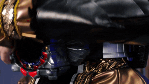 a close up of a person 's torso with a helmet on it