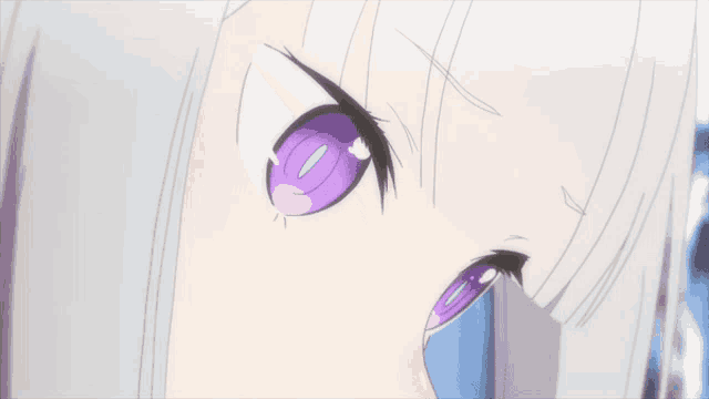 a close up of a girl 's eyes with white hair