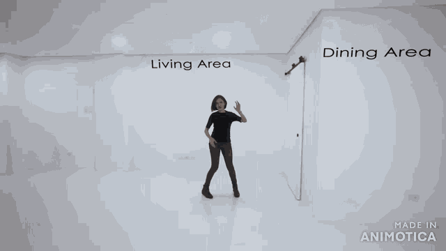 a woman opens a sliding barn door to a bathroom made in animatica