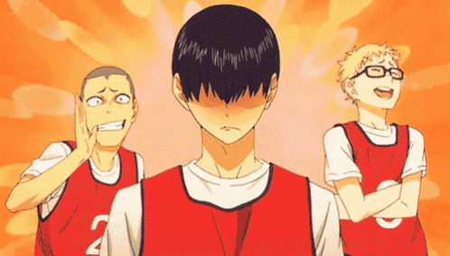 a group of anime characters standing next to each other with one wearing a number 2 jersey