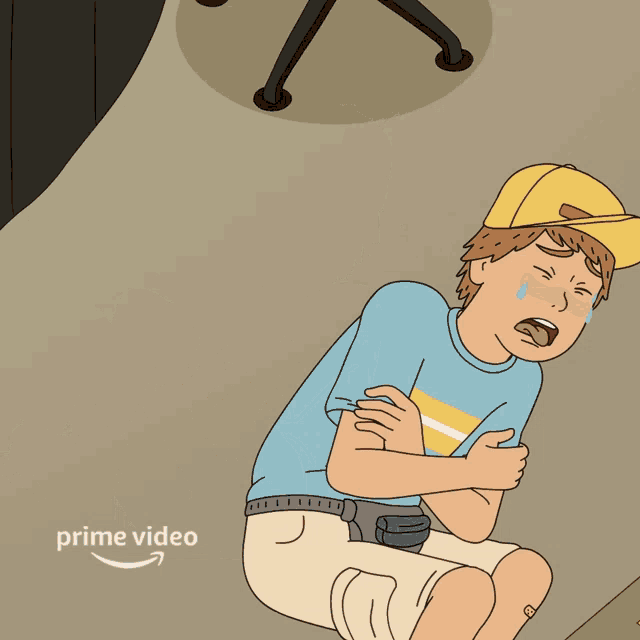 a cartoon of a boy laying on the ground with a bandage on his leg and the word prime video below him
