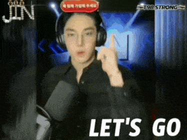 a man with headphones says let 's go