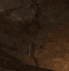an aerial view of a man holding another man 's head
