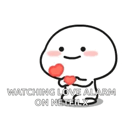 a cartoon character is holding a heart in his hands .