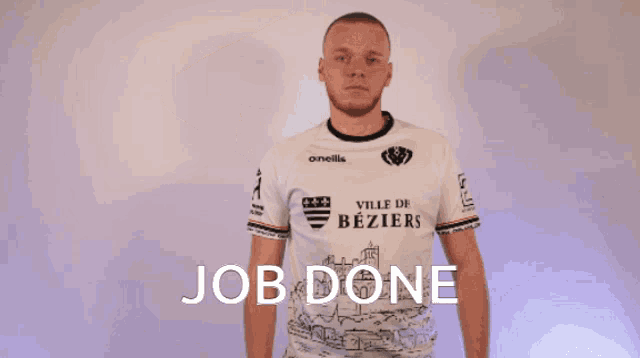 a man wearing a shirt that says job done