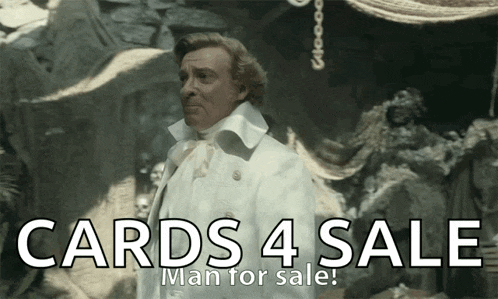 a man is standing in front of a sign that says cards 4 sale