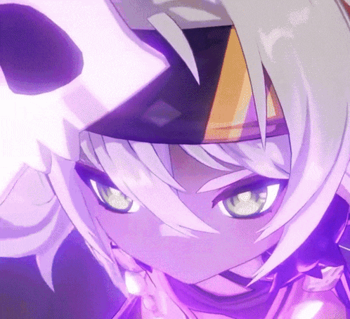 a close up of a person 's face with purple hair