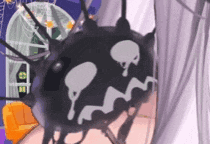 a cartoon drawing of a spider with a skull face on it
