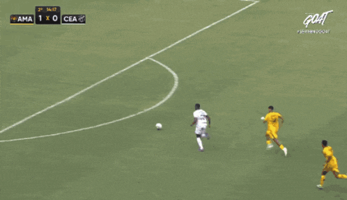a soccer game is being played with a score of 1 to 0