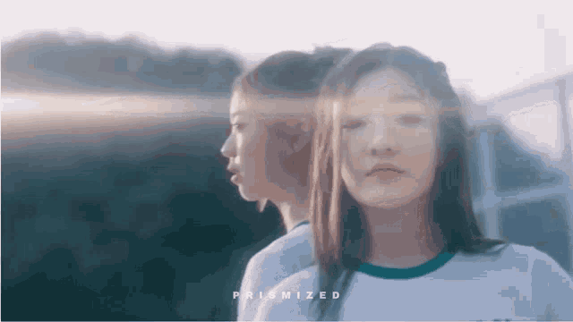 two girls are standing next to each other and the words prismized are on the bottom