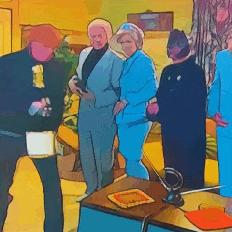 a group of people are standing around a table with a tray of food on it