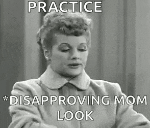 a black and white photo of a woman with a caption that reads `` practice disappointing mom look '' .