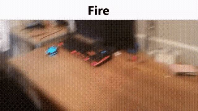 a blurred image of a wooden table with the word fire on the bottom .