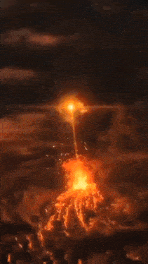 a painting of a person surrounded by flames in the dark