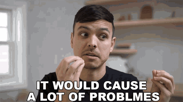 a man says " it would cause a lot of problems " while holding something in his hand