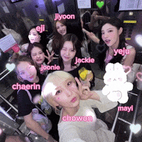 a group of girls are posing for a picture with their names written on them