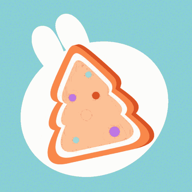 a cookie in the shape of a christmas tree with colorful sprinkles
