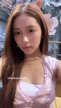 a close up of a woman 's face with the words thankyou4tdy on the bottom