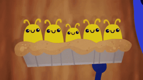 a bunch of yellow bugs are sitting on a pie