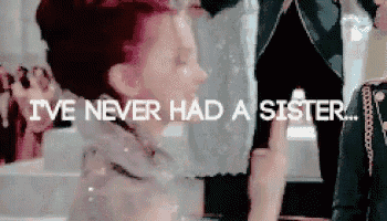 a woman with red hair is standing next to a man and says i 've never had a sister .