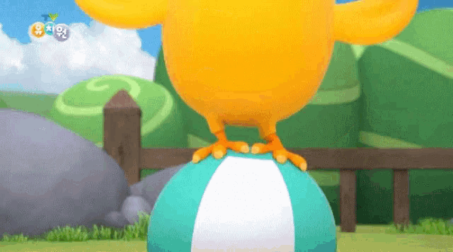 a cartoon chicken is balancing on a blue and white ball with the letters t and o on it