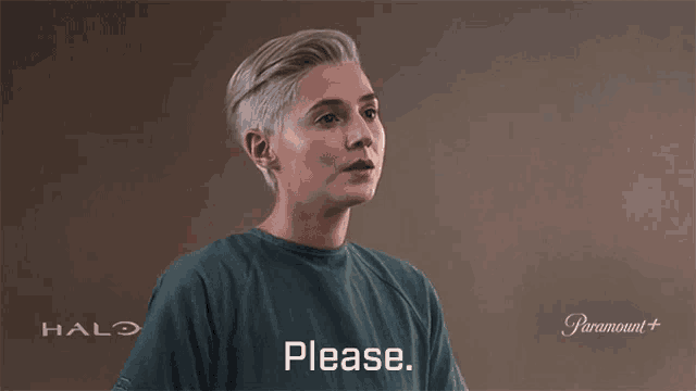 a woman is wearing a halo shirt and says please