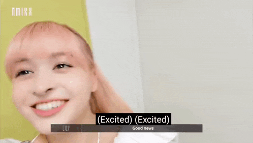 a woman wearing a white dress and a necklace says lily good news