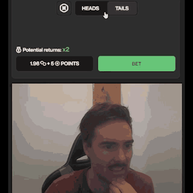 a man with a mustache is sitting in front of a screen that says potential returns