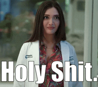 a woman in a lab coat with the words holy shit written on it