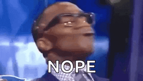 a man wearing glasses is making a funny face and saying nope .