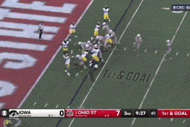 a football game between ohio st and iowa is being shown on cbs