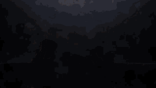 a large rock is being smashed into the ground with a light coming out of it