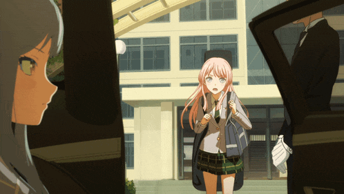 a girl in a plaid skirt stands in front of a building