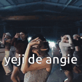 a group of women are dancing with the words yeji de angie in the corner