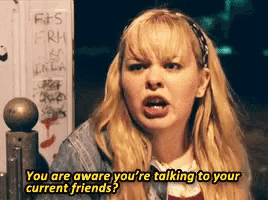 a woman is talking to her current friends