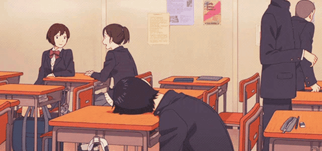 a group of people sitting at desks in a classroom with a poster on the wall that says ' afternoon ' on it