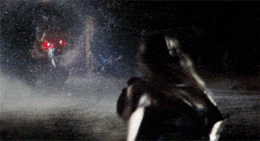 a woman in a black dress is running in the rain