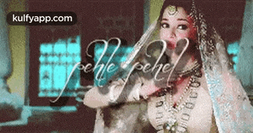 a painting of a woman with a veil on her head with the words kulfyapp.com on the bottom