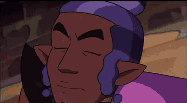 a cartoon character with a purple hat and green eyes is making a funny face .
