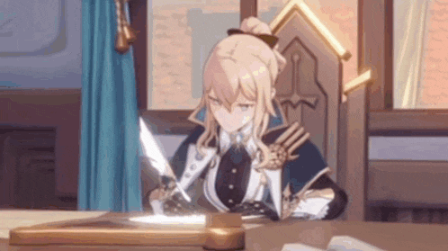 a woman is sitting at a table writing with a feather pen .