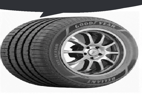 a close up of a good year tire with a speech bubble above it .