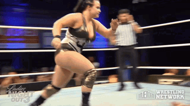 a woman in a wrestling ring with the words ladies night out 3