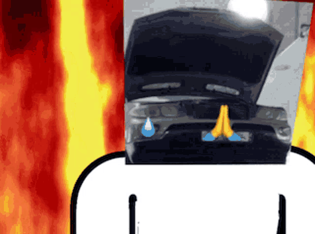 a picture of a car with the hood up and a tear coming out of the hood