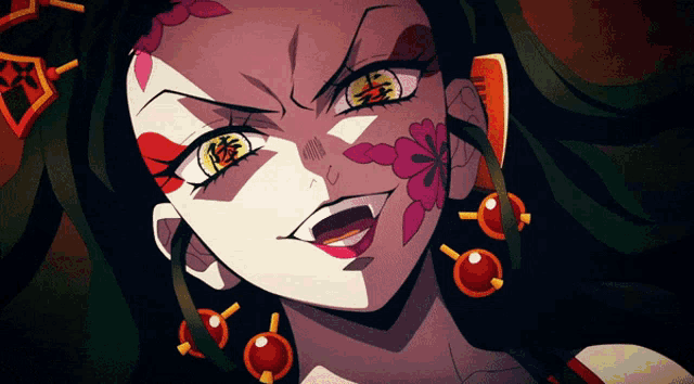 a close up of a woman with a flower on her face and earrings